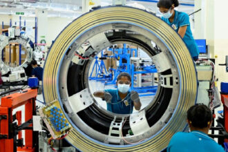 Modern manufacturing plant in India with automated assembly line