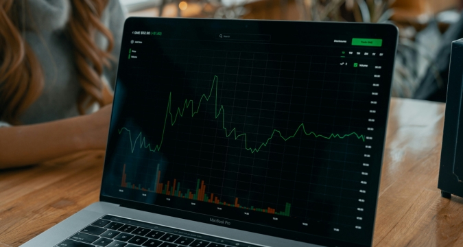 Analyst discussing sector rotation on digital chart