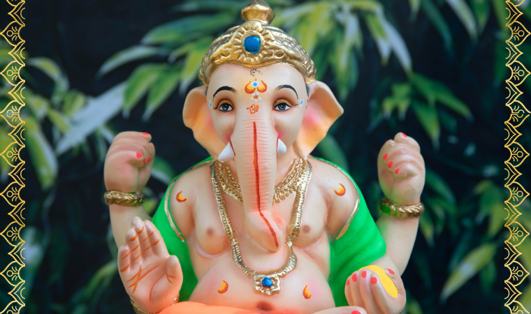 Eco-friendly Ganesh idol decorated in a colorful pandal during Ganesh Chaturthi 2025