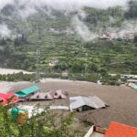 Flash floods washing away buildings in a Himalayan hill town