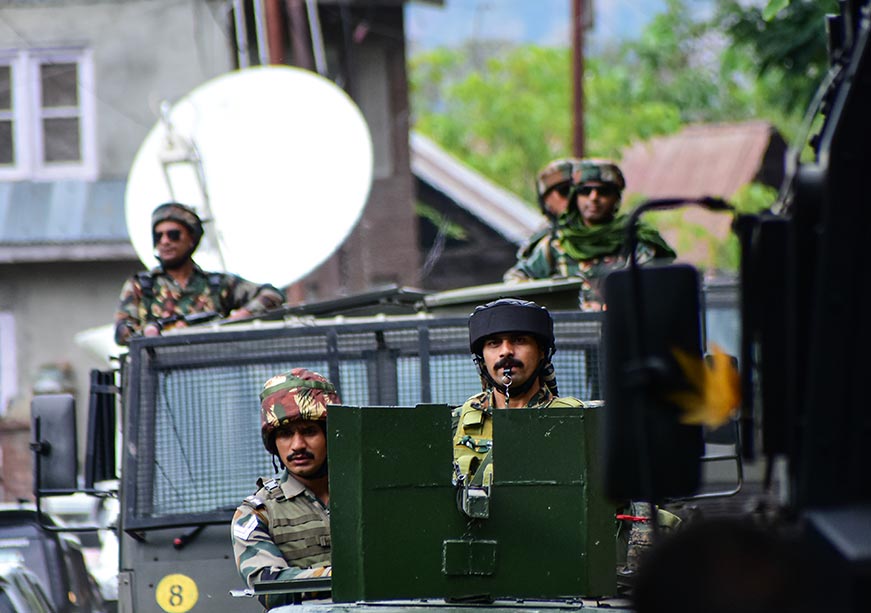 Indian security forces briefing during Operation Akhal
