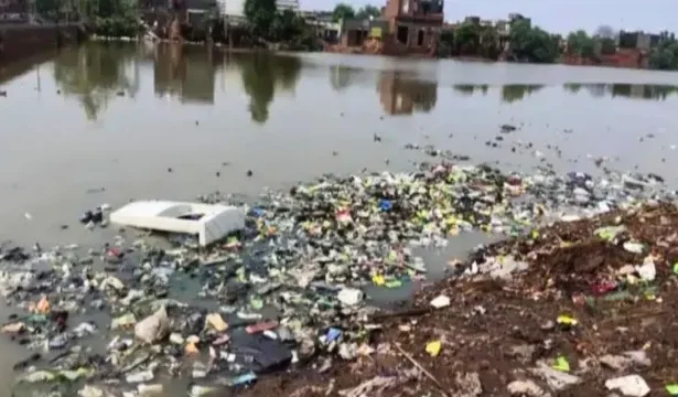 Aerial view of flooded farmland in Haryana after Yamuna water release, showing submerged villages and rescue operations