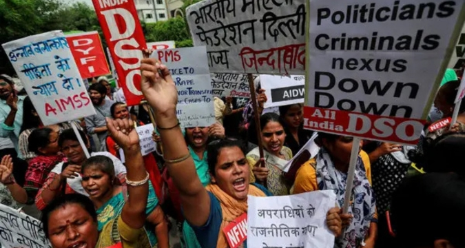 Delhi students protest against godman Swami Chaitanyananda