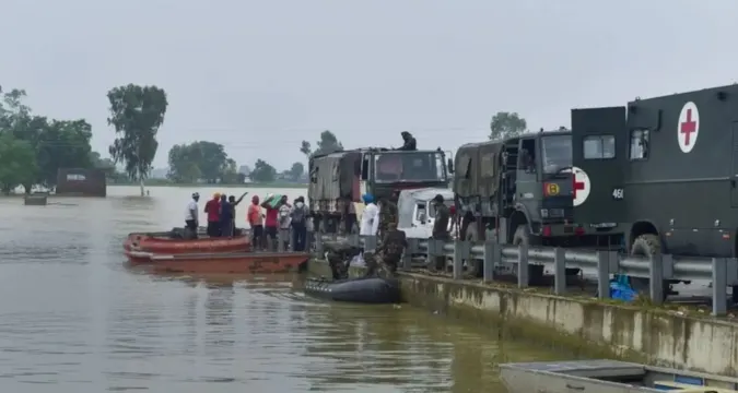 NDRF and Army personnel rescuing families in Punjab floods, 2025