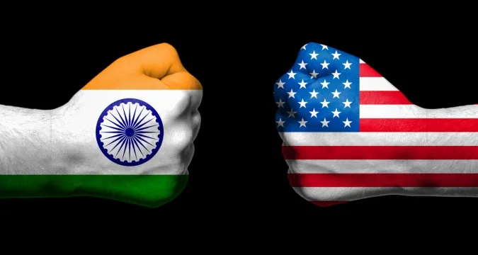 Indian and American flags side by side, representing strained diplomatic relations