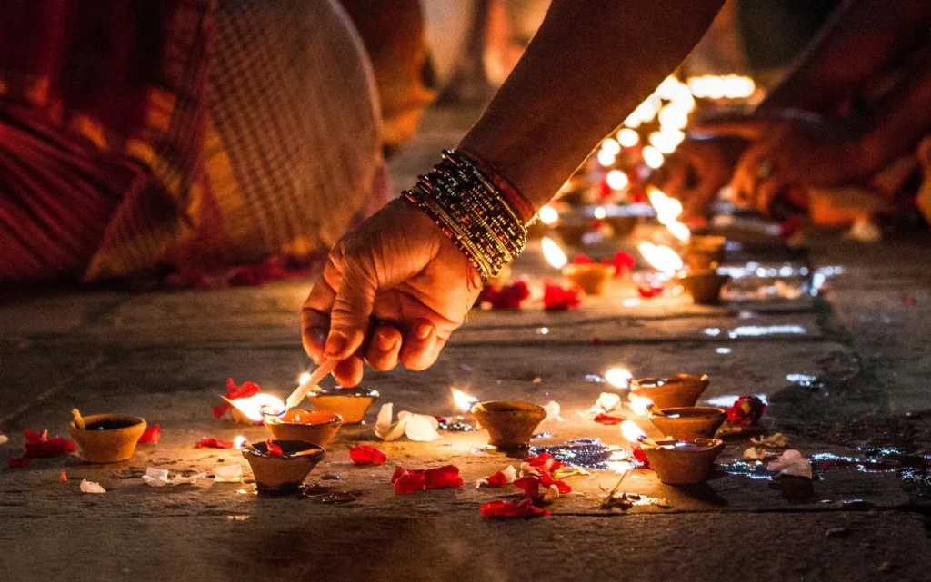 Indian family buying gold coins and utensils during Dhanteras 2025