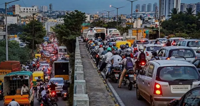 Representation of rising road rage and traffic violence in Indian cities with Bengaluru skyline