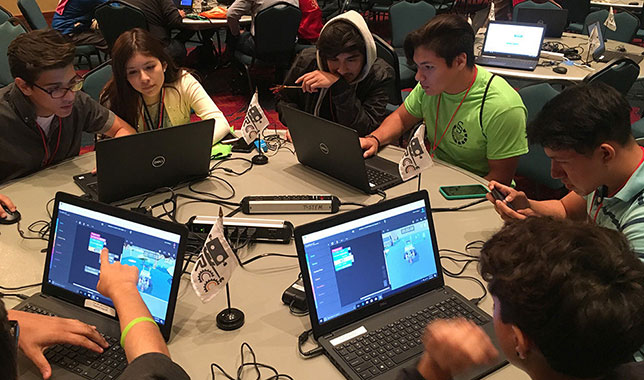 Students participating in a robotics or coding competition in India