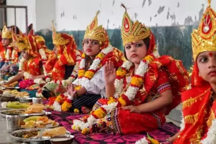 Women performing Pushpanjali and Kanya Puja rituals on Durga Ashtami 2025 in India