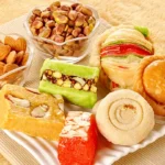 Indian family celebrating Diwali together with sweets, diyas, and laughter