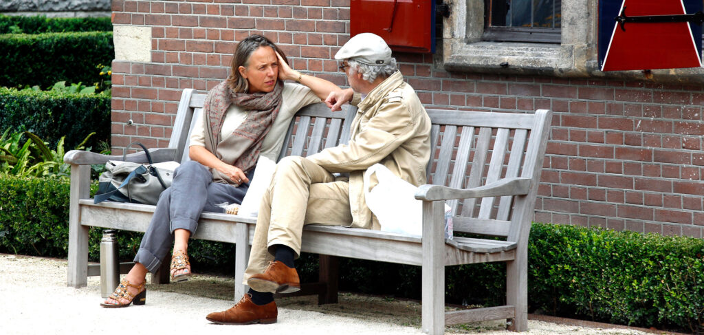 People from different backgrounds sharing traditional meals, illustrating global unity and emotional intelligence through travel.