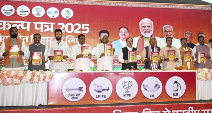 Voters queuing at polling stations Bihar 2025