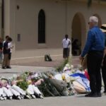 A memorial vigil honours victims of religious hate crimes globally, including targeted attacks on Jewish communities.