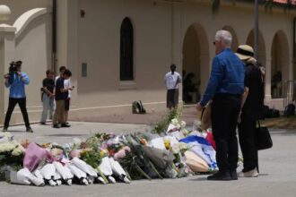 A memorial vigil honours victims of religious hate crimes globally, including targeted attacks on Jewish communities.