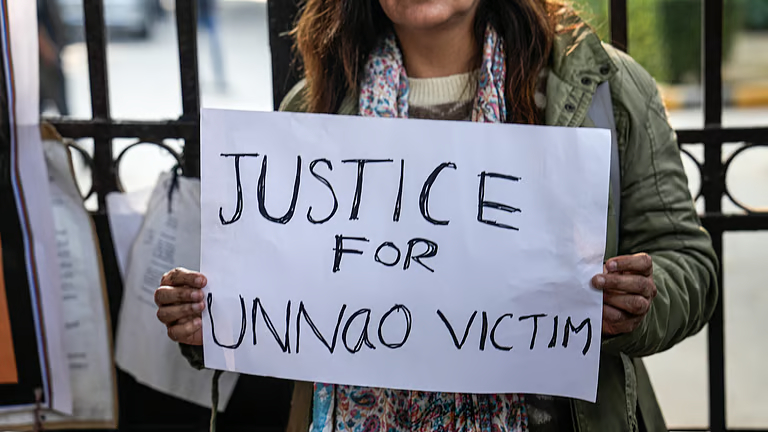 Public protest demanding justice in the Unnao rape case in India