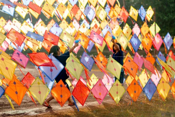 People flying kites during Makar Sankranti celebrations in India