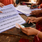 Indian voters standing in queue for voter list verification during SIR process