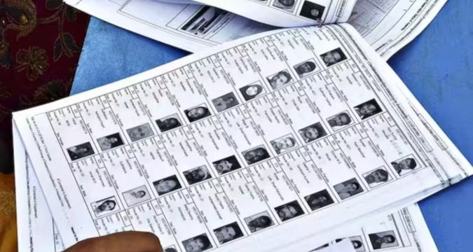 Election officials verifying voter list during nationwide revision in India