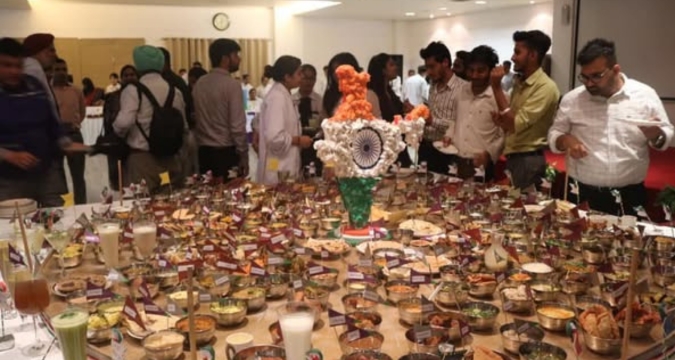 Massive traditional vegetarian feast at Udaipur wedding with hundreds of regional Indian dishes served to thousands of guests