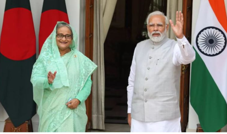 Modi and Sheikh Hasina side by side at a press gathering, representing regional diplomacy and bilateral discussions.