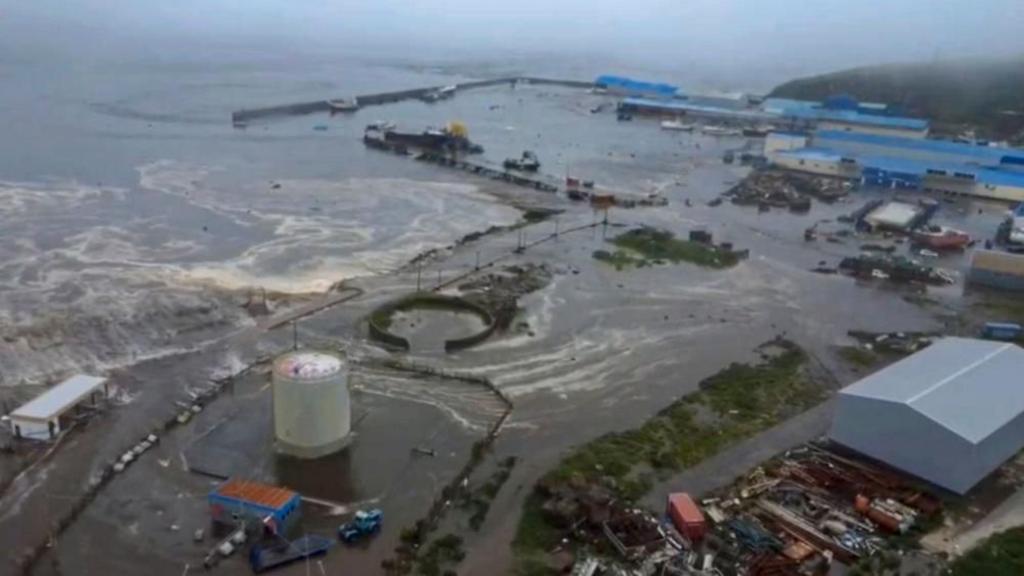 Tsunami waves crash into Japan's northern coastline after 8.7 earthquake